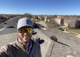 Carson on a roof after a minor repair