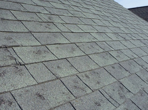 sever hail damage to a roof