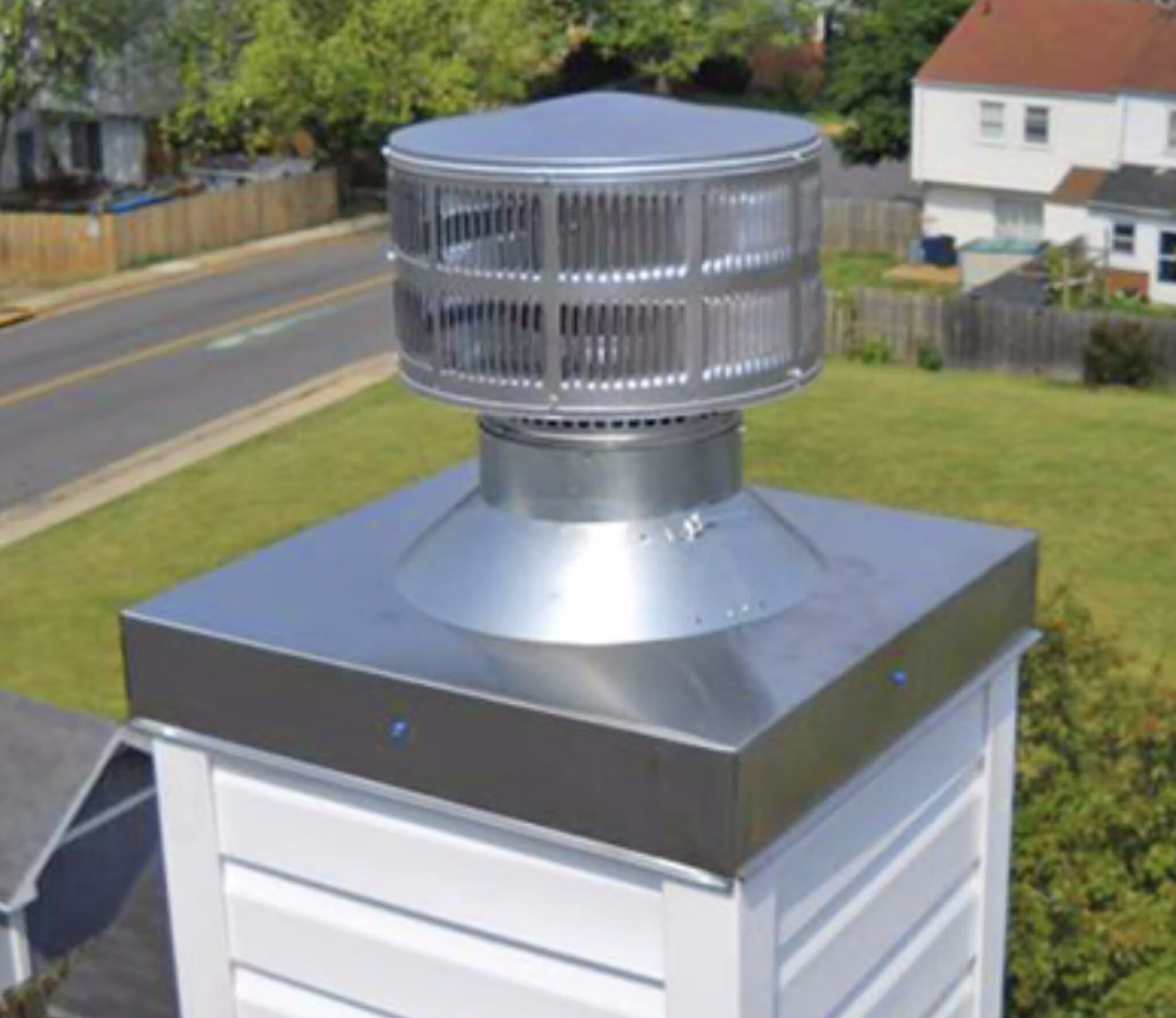 New chimney cap and vent on a Dallas-Fort Worth roof by Davis Roofing Solutions