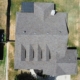 Straight-down aerial of a newly shingled roof with clean ridgelines and roof vents